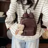Moda Otoño 2026 Nuevo Bolso de Hombro de Dibujos Animados Colgante Lindo Portátil Cruzado Mochila Ligera de Lujo para Mujer