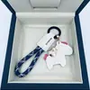 Fique Rico Imediatamente Pingente de Chaveiro de Couro de Vaca Feito à Mão para Carro Lanyard Elegante Simples Exquisito para Casais Masculinos e Femininos