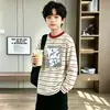 Camiseta de manga larga a rayas de retazos de algodón puro para niños 2026 primavera y otoño casual versátil camiseta base para niños y niños mayores moderna