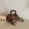 Bolso de lunares de nicho súper popular para mujer, nuevo y exquisito minibolso cruzado versátil 2026, bolso cilíndrico de mano más vendido