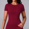 Conjunto de yoga ajustado sin espalda transfronterizo europeo y americano, ropa de fitness de secado rápido, pantalones cortos deportivos de manga corta para correr al aire libre y pantalones de yoga