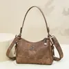 Bolsa de comércio exterior feminina 2025 novo modelo bolsa de mamãe versátil bolsa de ombro de grande capacidade couro macio bolsa tote multicamadas bolsa de axila