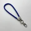 Cordão de Pulso para Celular em Poliéster Tecido 7mm com Fecho de Coração Alça Anti-perda Alça para Garrafa de Água Chaveiro Alça de Pulso para Câmera