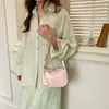Bolsa Retrô Francesa para Mulheres Verão 2026 Bolsa de Ombro Fresca Menina Suave Coração Girly Textura de Lichia Bolsa de Mão Decorativa
