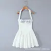 Estilo Europeo y Americano 2026 Nuevo Estilo Francés Pura Pasión Vestido Mini Dulce Bordado de Cuello Halter Ceñido a la Cintura Ajustado con Tirantes Finos