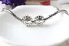 Huiyue sartén hogar personalidad creativa DIY Flor de Océano cara sonriente cuenta de agujero grande pulsera hilo decoración Yiwu fabricantes mayorista