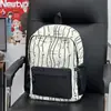 Mochila estampada de cachorrinho listrado de desenho animado para meninas, fresca e de grande capacidade, bolsa de ombro versátil para o dia a dia, escola para alunos do ensino fundamental II e médio