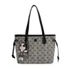 Bolso de mano elegante y de alta gama de gran capacidad para mujer, nueva colección 2026, adecuado para el trabajo diario, con diseño de lunares y rayas, y se puede llevar como bolso de hombro o bolso tote