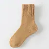 Calcetines de color sólido de comercio electrónico transfronterizo, venta al por mayor de invierno, calcetines altos de tubo gruesos y cálidos para mujer, calcetines de comercio exterior