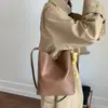 Bolso de Hombro Retro de Alta Gama Transfronterizo para Mujer 2025 Nuevo Bolso Cubo de Lado Suave Bolso de Hombro Versátil Bolso Cruzado Elegante
