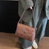 Nueva colección de principios de otoño de 2026: bolso de axila casual y elegante para mujer, un bolso cuadrado pequeño chic y versátil, un bolso de hombro o bandolera retro y versátil