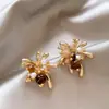 Brincos redondos com gotas de óleo estilo Maillard, luxo leve, alta qualidade, modernos, ear cuffs simples, elegantes e versáteis, brincos de nicho para mulheres