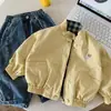 Jaqueta Masculina Bangcheng 2026 Outono Novo Estilo Versão Coreana Jaqueta Reversível de Desenho Animado Infantil Roupa de Outono para Bebê Top