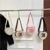 Bolso de mano transfronterizo de moda estilo coreano, bolso de mujer, nueva colección de verano 2026, bolso de hombro color block con estampado de letras, adecuado para ir al trabajo y uso casual