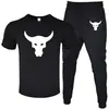 Camiseta de Manga Curta e Calça Masculina Europeia e Americana Mais Vendida Terno Casual Gola Redonda Cor Lisa Terno Esportivo Casual Venda Direta da Fábrica