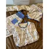 Conjunto de pijama camisola lindo de estilo coreano de moda con estampado para mujer, nueva colección primavera/otoño 2026, cárdigan, pantalón largo y un conjunto de ropa de estar por casa de tres piezas