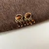 Pendientes Melard redondos estilo europeo y americano, estilo retro de Hong Kong, diseño de nicho, modernos y versátiles, pendientes elegantes, venta al por mayor