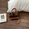 Bolso bandolera de charol brillante para mujer con estampado de piel de serpiente, nuevo 2026, elegante, para el hombro, bolso de mano tipo concha