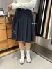 Coleção Outono/Inverno 2026: Saia midi plissada em A de lã estilo retrô Miu para mulheres, completa com um cinto