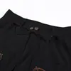 Calça Masculina de Sarja com Bordado Personalizado no Bolso, Calça de Moletom Tendência Estilo Americano com Design de Asa, Calça Longa de Perna Larga