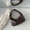 Nova Moda Bolsa de Um Ombro Feminina Estilo Coreano Nicho Versátil para o Dia a Dia Bolsa de Mão Simples Couro PU Macio Bolsa de Axila Bolinho Feminina