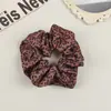 Aro para el pelo de leopardo retro elegante con pelo prensado, banda elástica para el pelo de nicho de alta gama, conjunto de gomas para el pelo, accesorios para el pelo