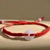 D05 (Envío gratis en pedidos superiores a 4.9) Pulsera de Cuerda Roja con Hebilla Ping an Pulsera Trenzada del Festival del Bote del Dragón