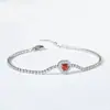 Pulsera de gemas grandes de circón en forma de corazón europea y americana de alta retención de color, femenina, de alto sentido, nicho, acero de titanio, resistente al color, ajustable, plateada