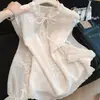 Bordado de Renda Francesa Flor Pequena Malha Gola Alta Manga Longa Chiffon Camisa Feminina 2026 Início da Primavera Novo Estiloso Top Tendência