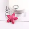Llavero de Cuero PU Colorido Estrella de Cinco Puntas Círculo Plano Cadena Llavero para Bolso Muñeca Coche Colgante de Joyería