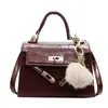 Bolso de mujer personalizado, bolso de hombro versátil para mujer con estampado de piedra, nuevo bolso de mano de moda de invierno, bolso Kelly retro a la moda