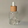 Frasco Conta-Gotas Redondo de Fundo Vulcânico 30ml em Estoque do Fabricante para Mistura de Óleos Essenciais, Líquido de Essência e Sub-Envasamento de Aromaterapia Atacado