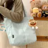 Bolso de hombro casual simple estilo japonés inspirado en Ins para mujer, nuevo modelo 2024, bolsa de mano de gran capacidad, color liso para estudiantes