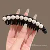 Pinza para el pelo de plátano con lunares estilo coreano para mujer, versátil y simple, nuevo modelo 2026, moderno y elegante, pinza para el pelo de alto valor estético
