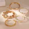Pulsera de Mujer Exagerada Transfronteriza Europea y Americana con Torsiones Onduladas, Diseño Geométrico Irregular, Acabado Brillante, Sensación Elegante y de Alta Gama