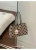 Bolso de hombro para mujer para estudiantes, bolso de mano casual de gran capacidad, bolso de lona simple estilo coreano con lunares y correa ancha para el hombro, transfronterizo