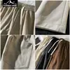 Nuevo Estilo de Verano del Explorador Versión Coreana para Hombre Pantalones Rectos Sueltos Elásticos Color Sólido de Pareja Modernos Elegantes