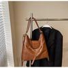 Bolso de mano de gran capacidad para mujer, bolso cruzado informal de alta gama con textura de nicho, combinable con todo, para uso diario en el comercio exterior, 2025