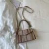 Bolsa de Ombro de Mão Estilo Ocidental 2025 Verão Nova Moda Tendência Versátil Bolsa Transversal Retrô Simples