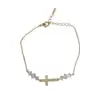 Pulseira de cruz com diamantes incrustados, moda retrô de temperamento nicho, requintada, luxo leve, versátil, toque de alta qualidade, joia de mão super brilhante, atacado