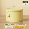 Mesa de noche redonda de plástico moderna estilo crema para habitaciones pequeñas, mueble de almacenamiento simple de pie