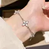 Pulsera de flor de circonita y nácar chapada en oro real de 18k, pulsera de estilo coreano ins de alta gama, joyería versátil de lujo ligero para mujer