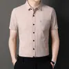 Camisa de manga corta de algodón y lino para hombre, informal, de verano, con estampado a cuadros, fina, con bolsillo real, para mediana edad