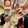 Chaveiro de ouro 999 puro com motivo de dinheiro, pingente de ouro, decoração de bolsa, presente para live stream, presente de Ano Novo do Ano do Cavalo atacado
