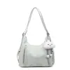 2025 Maillard Color Puro Nuevo Bolso Tote Mujer Texturizado Commuter Bolso de Axila Estilo Extranjero Gran Capacidad Hombro Único Cruzado