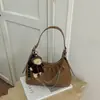 Bolso de cadena de diseño nicho estilo coreano transfronterizo para mujer, bolso de hombro de estilo 'hot girl' de moda, bolso de hombro y bandolera para el día a día