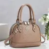 Nuevo bolso cruzado vintage con relieve de concha para mujer, bolso de mano moderno y versátil, bolso de hombro, bolso cruzado, bolso de nicho de moda