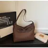 Bolso Versátil de Nicho para Mujer 2025 Nuevo Modelo Textura de Alta Calidad Bolso de Hombro Cruzado Súper Popular Bolso Tote de Gran Capacidad para el Trabajo