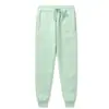 Pantalones de chándal de forro polar para hombre y mujer de 19 colores Leggings de placa ligera Pantalones de chándal Cintura elástica Pantalones de lápiz Pantalones Productos de fábrica al por mayor