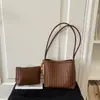 Moda transfronteiriça popular simples para o dia a dia bolsa de palha trançada design de nicho bolsa de ombro estilosa grande capacidade bolsa de ombro único